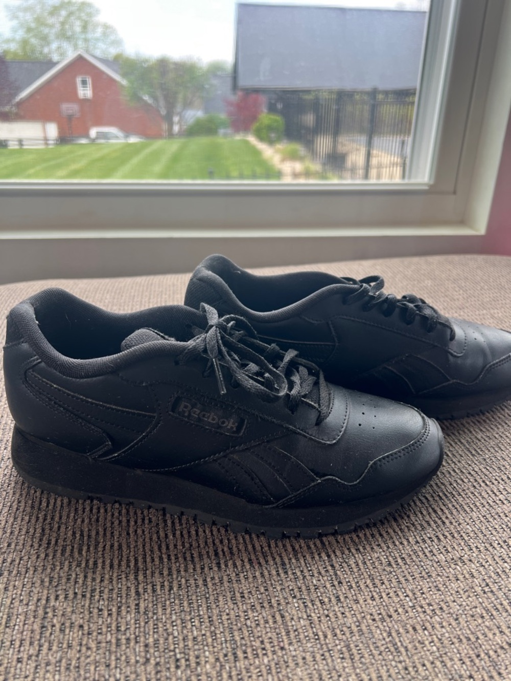Reebok Men's All-Black Leather Classic Trainer